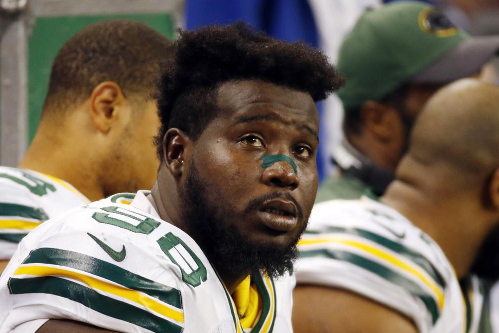 Ex-Packer Guion gets 1 year for domestic violence assault