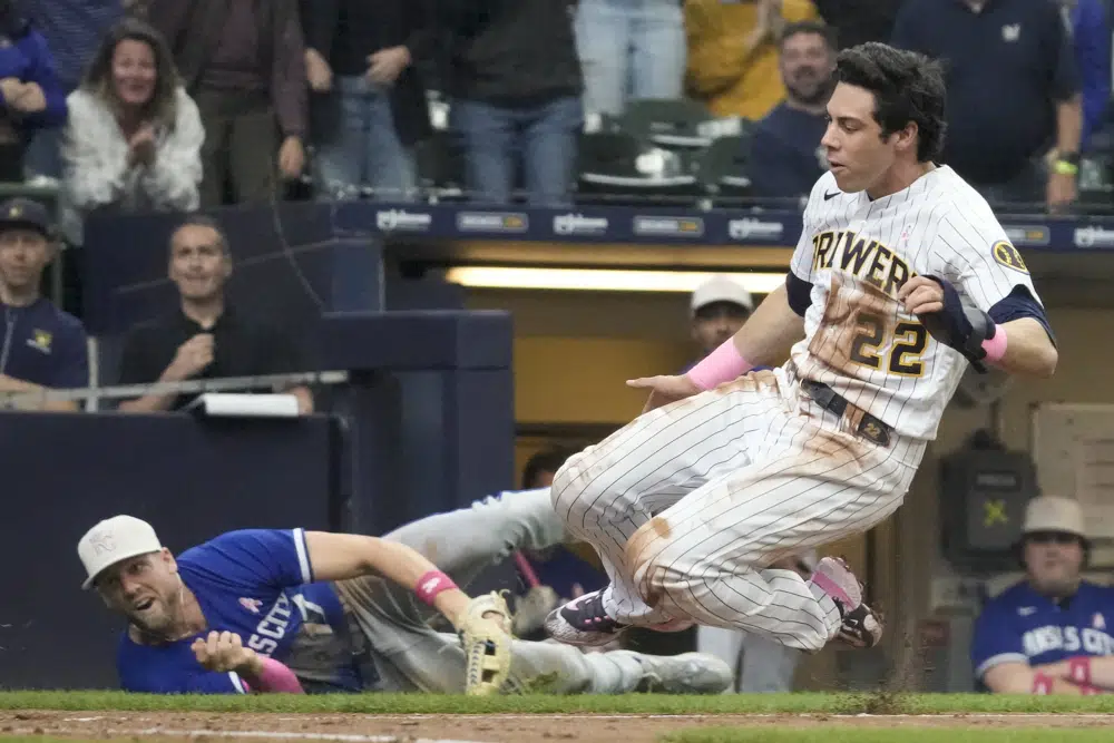 Yelich stays hot as Brewers defeat Royals 9-6 to complete sweep