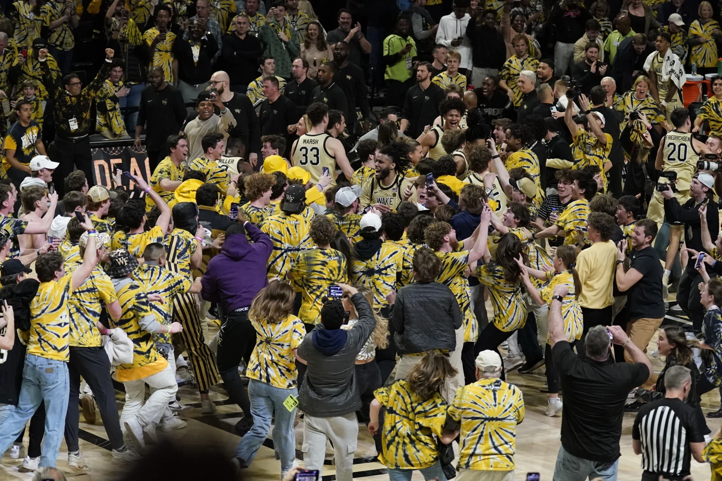 The potential hazards of fans storming the court has run smack into a question: How to stop them?