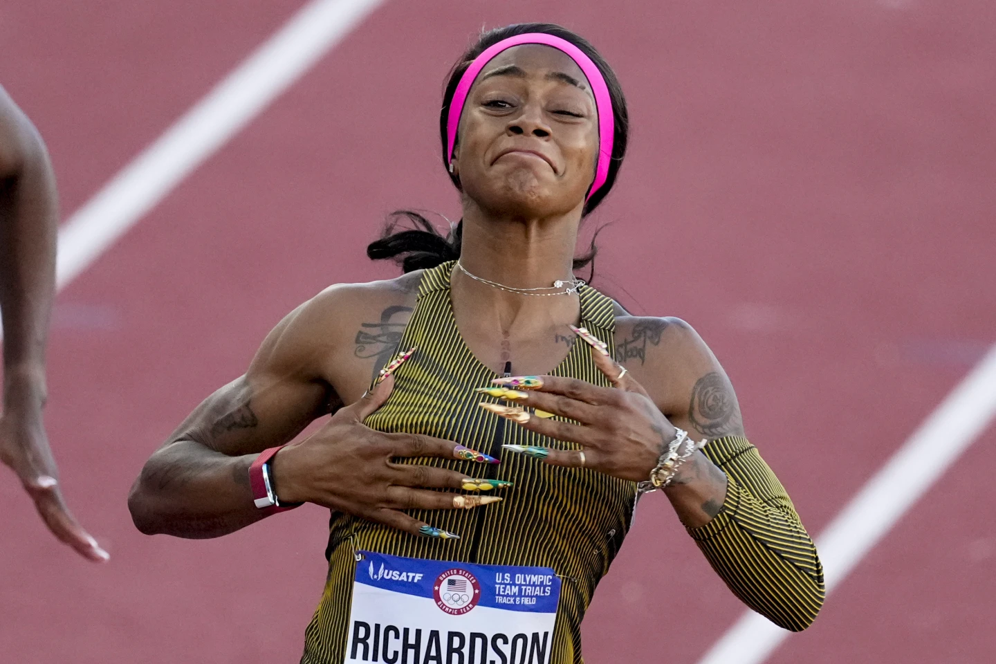 Sha’Carri Richardson sprints onto US Olympic team after winning 100 in 10.71 seconds — won first heat with shoe untied