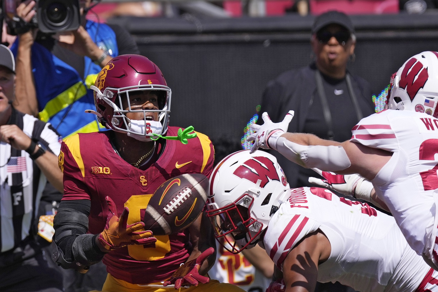 Badgers blow double-digit halftime lead in losing to No. 13 USC