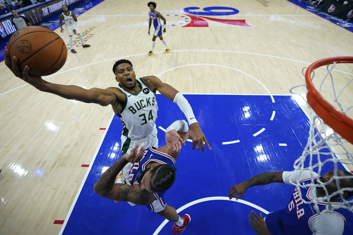 Lillard, Antetokounmpo power Bucks past short-handed 76ers