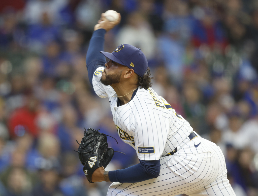 Peralta helps Milwaukee avoid a sweep as Cubs lose Imanaga to hamstring injury