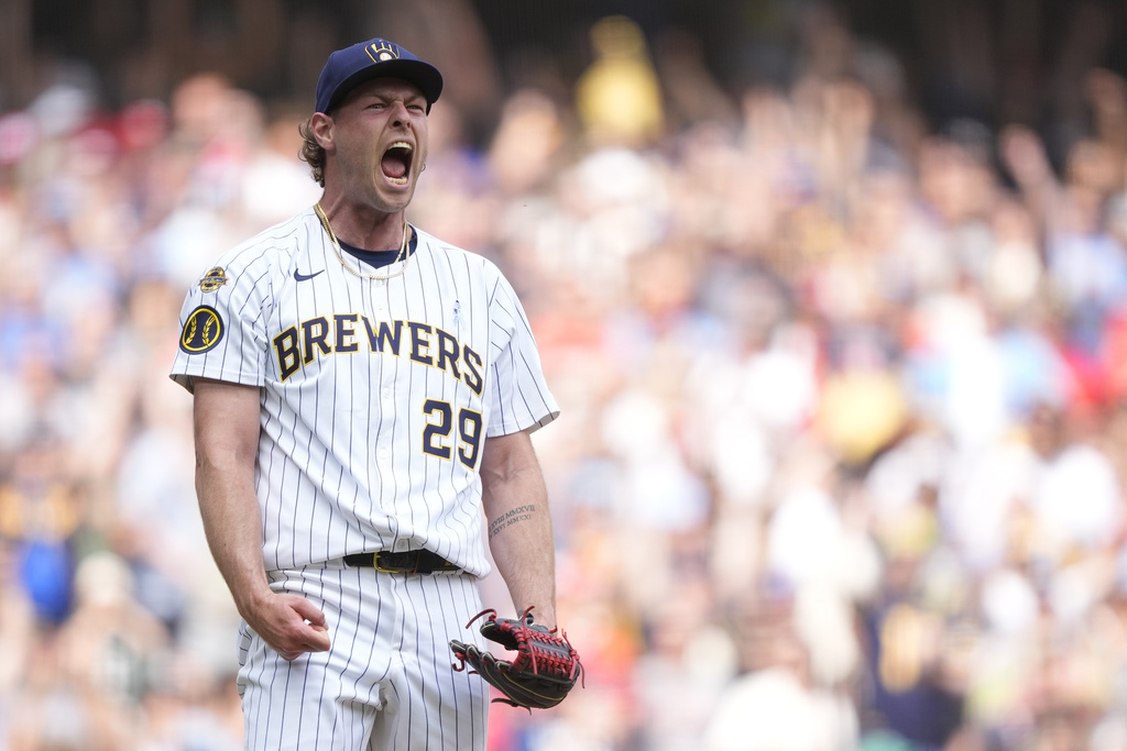 Yelich homers and Megill escapes a 9th-inning jam as the Brewers top the Cardinals 3-2